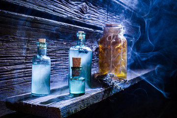 Magical witch lab full of blue potion for Halloween