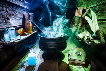 Magical witch workshop with blue and green smoke for Halloween