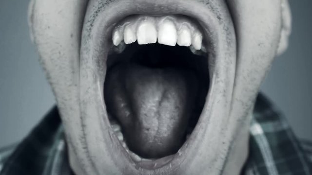 close up of screaming man
