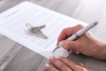 Customer signing a real estate contract