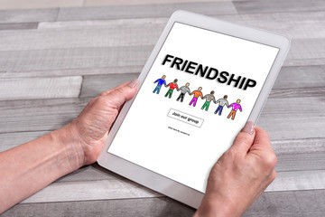 Friendship concept on a tablet