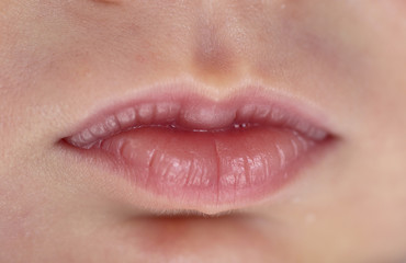 Obraz premium macro of a baby lips