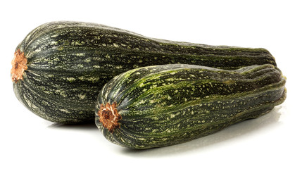 Two green zucchini isolated on white background
