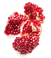 Ripe pomegranate fruit segment isolated on white background cuto