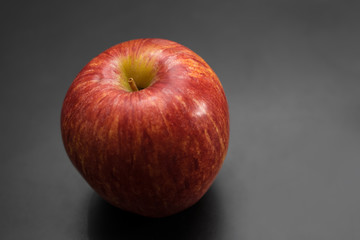red apple on black table, red apple background for good health c