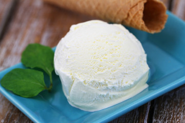Scoop of home made vanilla ice cream, closeup
