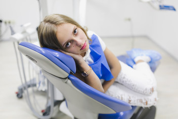 Girl patient complains dentist