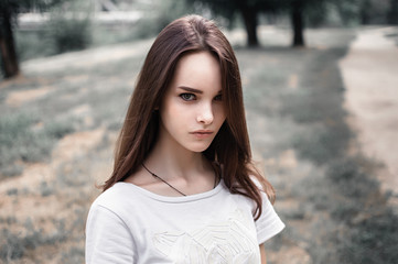 Fototapeta premium portrait of a beautiful girl closeup on street