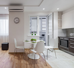 Interior of modern apartment in scandinavian style with kitchen
