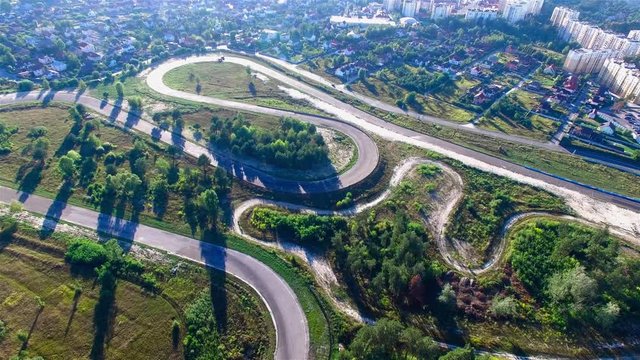 Road racing track 4k aerial video. Races: off-road, on road, circuit, for motocross, bike, auto. Extreme sport concept