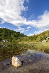 Fototapeta premium Beautiful alpine lake with clear water
