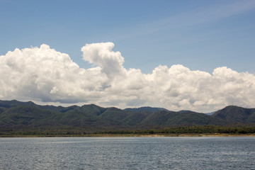 lake water and mountain with blue sky