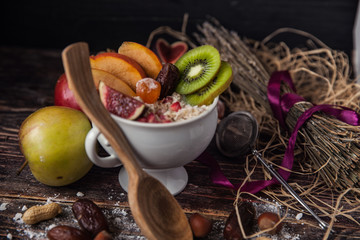 Oatmeal with berries, fruits and nuts