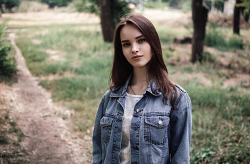portrait of a beautiful girl closeup on street 