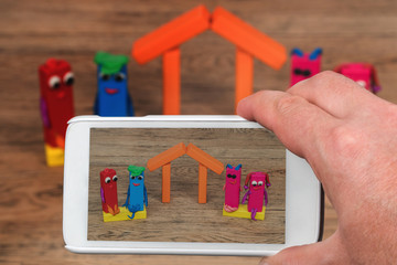 Hand photographing children handicrafts