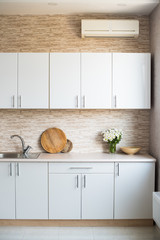 interior of new bright white home kitchen