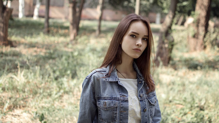 portrait of a beautiful girl closeup on street 