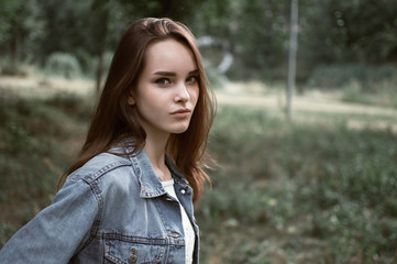 portrait of a beautiful girl closeup on street 