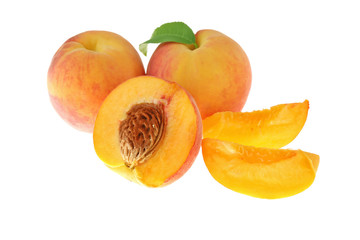 Fresh peaches on a white background