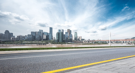 cityscape and skyline of chongqing from empty asphalt road