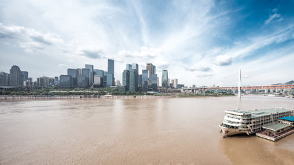 cityscape and skyline of chongqing from water