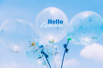  Blue party balloons on sky background