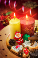 Obraz na płótnie Canvas .Burning candles and cookies with Christmas decoration, Xmas bac