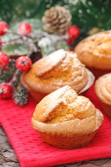 Fototapeta na wymiar Christmas muffins covered powdered sugar