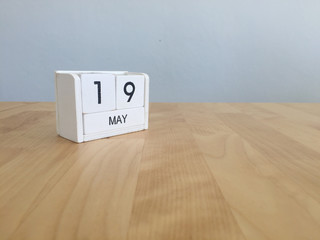 May 19th.May 19 white wooden calendar on vintage wood abstract b