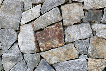 old stone wall Texture in weathered and have natural surfaces.