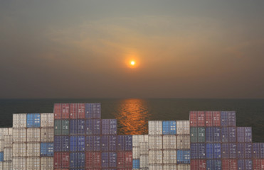 Cargo containers stack in port and sky sunset background.