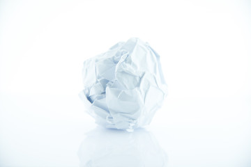 Crumpled paper ball, rejection and failure idea.