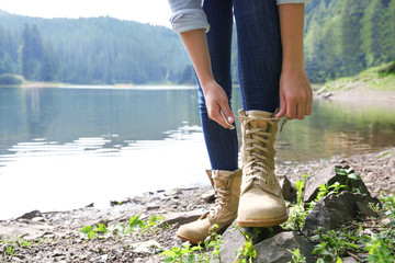 Girl tying shoelaces