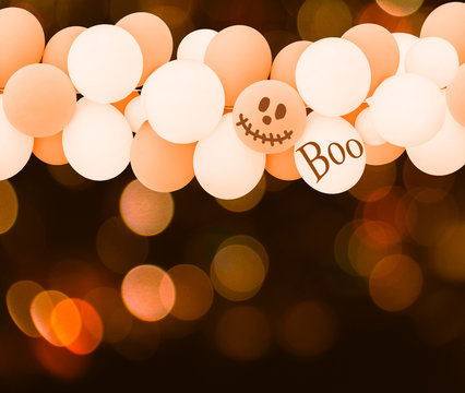 white and orange balloons for halloween background
