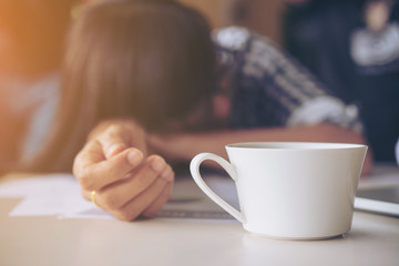 sleeping on the table in working time.