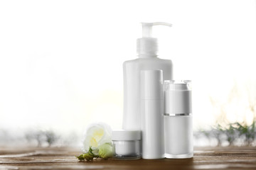 Cosmetics set on light background