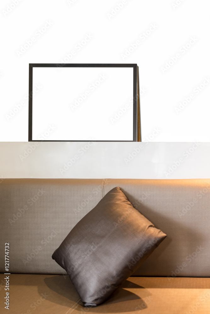 Wall mural White blank picture frame with pillow decorate on wall bar white