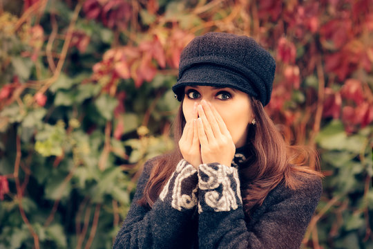 Cute Girl With Autumn Allergies Sneezing