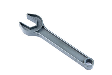 Children's toy tool plastic color wrench isolated on white backg