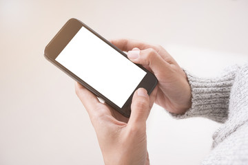 using smart phone showing blank white screen in woman hand. concept communication