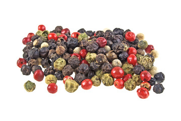 Heap of various pepper peppercorns seeds mix on white background
