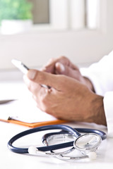 stethoscope with the doctor and the mobile