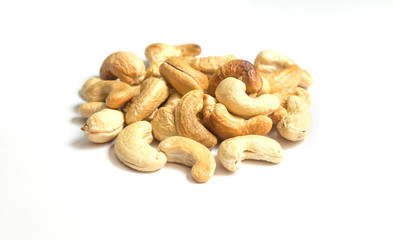 cashew nuts heap on white background