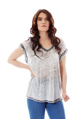 Obraz premium Angry young woman with clenches fist