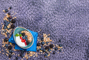 Baked granola with  yogurt and berries