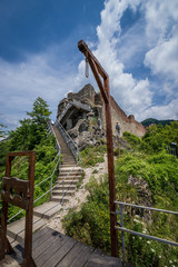 Gallows and guillotine in front of Ruined Poenari Castle on Mount Cetatea in Romania