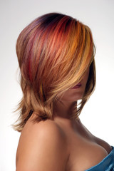 Naklejka premium Portrait of a beautiful girl with dyed hair, professional hair colouring