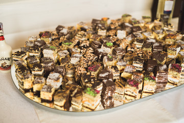 Different kinds of baked sweets on a buffet