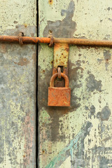 Old industrial door with sliding lock