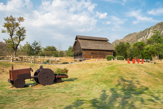 Livestock barn wooden with cart in slope farm, Primo Piazza, Khao Yai